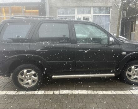 Черный Мазда Трибьют, объемом двигателя 2.3 л и пробегом 187 тыс. км за 4500 $, фото 6 на Automoto.ua