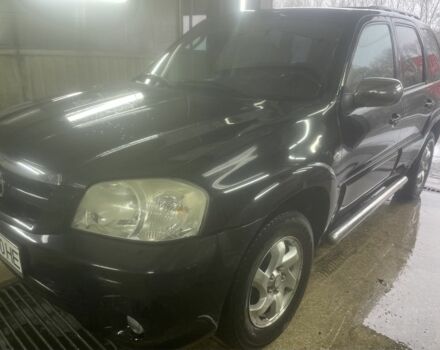 Черный Мазда Трибьют, объемом двигателя 2.3 л и пробегом 187 тыс. км за 4500 $, фото 5 на Automoto.ua