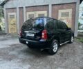 Черный Мазда Трибьют, объемом двигателя 2.3 л и пробегом 150 тыс. км за 5500 $, фото 4 на Automoto.ua