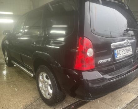 Черный Мазда Трибьют, объемом двигателя 2.3 л и пробегом 187 тыс. км за 4500 $, фото 2 на Automoto.ua