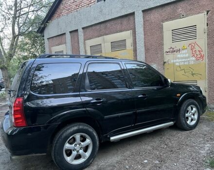 Черный Мазда Трибьют, объемом двигателя 2.3 л и пробегом 150 тыс. км за 5000 $, фото 3 на Automoto.ua