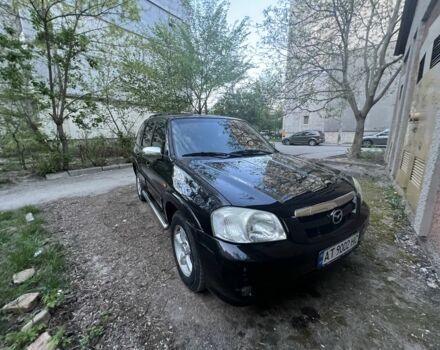 Черный Мазда Трибьют, объемом двигателя 2.3 л и пробегом 150 тыс. км за 5000 $, фото 1 на Automoto.ua