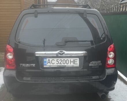 Черный Мазда Трибьют, объемом двигателя 2.3 л и пробегом 187 тыс. км за 4500 $, фото 1 на Automoto.ua