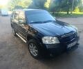 Чорний Мазда Трибьют, об'ємом двигуна 2.3 л та пробігом 223 тис. км за 4500 $, фото 1 на Automoto.ua