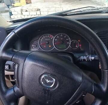 Мазда Трибьют 2005 в Шостке на Automoto.ua Черный Мазда Трибьют, объемом двигателя 2.97 л и пробегом 141 тыс. км за 5500 $, фото 12 на Automoto.ua