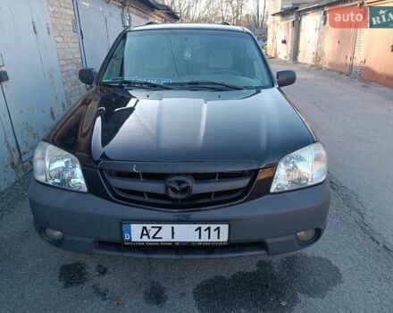Чорний Мазда Трибьют, об'ємом двигуна 2 л та пробігом 289 тис. км за 3136 $, фото 1 на Automoto.ua