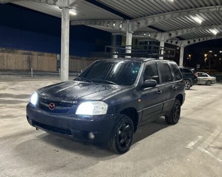 Черный Мазда Трибьют, объемом двигателя 2 л и пробегом 277 тыс. км за 2100 $, фото 1 на Automoto.ua