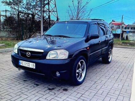 Чорний Мазда Трибьют, об'ємом двигуна 3 л та пробігом 270 тис. км за 6200 $, фото 1 на Automoto.ua