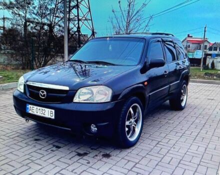 Черный Мазда Трибьют, объемом двигателя 3 л и пробегом 270 тыс. км за 6200 $, фото 1 на Automoto.ua