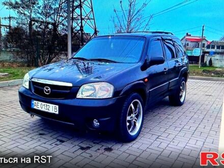 Чорний Мазда Трибьют, об'ємом двигуна 3 л та пробігом 270 тис. км за 6200 $, фото 1 на Automoto.ua