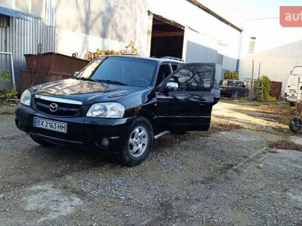 Чорний Мазда Трибьют, об'ємом двигуна 2 л та пробігом 267 тис. км за 4800 $, фото 1 на Automoto.ua