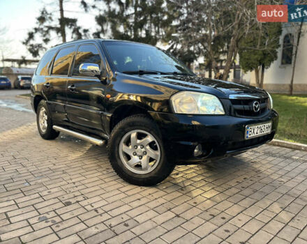 Черный Мазда Трибьют, объемом двигателя 2 л и пробегом 267 тыс. км за 4999 $, фото 1 на Automoto.ua