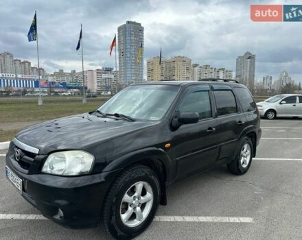 Черный Мазда Трибьют, объемом двигателя 2.26 л и пробегом 330 тыс. км за 4400 $, фото 1 на Automoto.ua