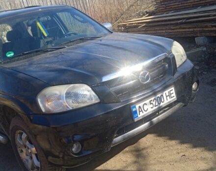 Черный Мазда Трибьют, объемом двигателя 2.3 л и пробегом 246 тыс. км за 6000 $, фото 1 на Automoto.ua