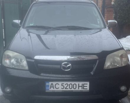 Черный Мазда Трибьют, объемом двигателя 2.3 л и пробегом 187 тыс. км за 4500 $, фото 1 на Automoto.ua