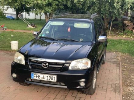 Чорний Мазда Трибьют, об'ємом двигуна 3 л та пробігом 260 тис. км за 2900 $, фото 1 на Automoto.ua