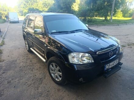 Черный Мазда Трибьют, объемом двигателя 2.3 л и пробегом 223 тыс. км за 4100 $, фото 1 на Automoto.ua