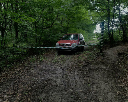 Красный Мазда Трибьют, объемом двигателя 1.99 л и пробегом 460 тыс. км за 4550 $, фото 4 на Automoto.ua