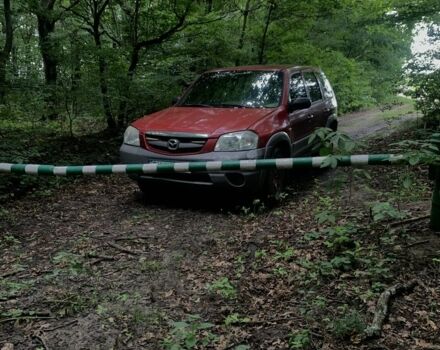 Червоний Мазда Трибьют, об'ємом двигуна 2 л та пробігом 460 тис. км за 4550 $, фото 3 на Automoto.ua