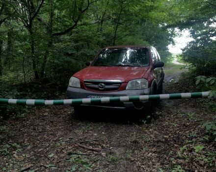 Червоний Мазда Трибьют, об'ємом двигуна 2 л та пробігом 460 тис. км за 4550 $, фото 2 на Automoto.ua