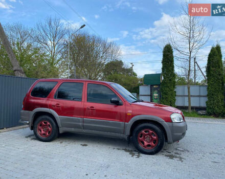 Красный Мазда Трибьют, объемом двигателя 1.99 л и пробегом 460 тыс. км за 4550 $, фото 5 на Automoto.ua