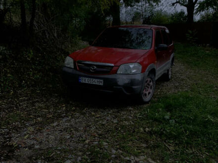 Красный Мазда Трибьют, объемом двигателя 1.99 л и пробегом 460 тыс. км за 4550 $, фото 1 на Automoto.ua