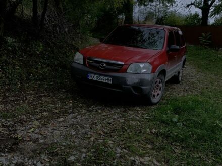 Червоний Мазда Трибьют, об'ємом двигуна 2 л та пробігом 460 тис. км за 4550 $, фото 1 на Automoto.ua