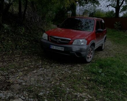 Червоний Мазда Трибьют, об'ємом двигуна 2 л та пробігом 460 тис. км за 4550 $, фото 1 на Automoto.ua
