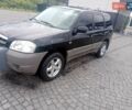 Мазда Трибьют, объемом двигателя 2 л и пробегом 290 тыс. км за 6100 $, фото 1 на Automoto.ua