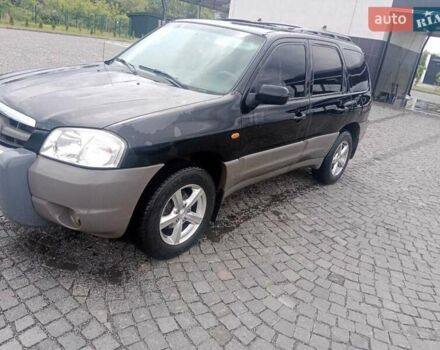 Мазда Трибьют, объемом двигателя 2 л и пробегом 290 тыс. км за 6100 $, фото 1 на Automoto.ua