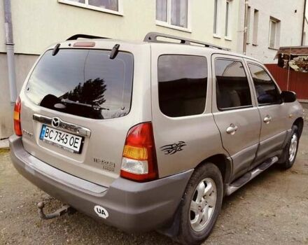 Сірий Мазда Трибьют, об'ємом двигуна 2 л та пробігом 301 тис. км за 5200 $, фото 1 на Automoto.ua