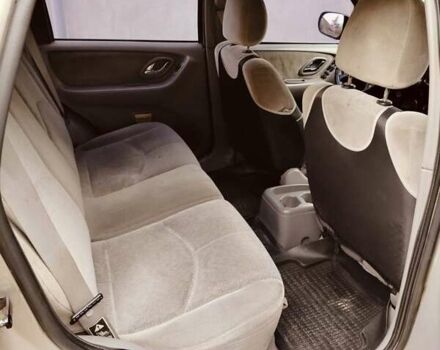 Сірий Мазда Трибьют, об'ємом двигуна 2 л та пробігом 301 тис. км за 5200 $, фото 9 на Automoto.ua