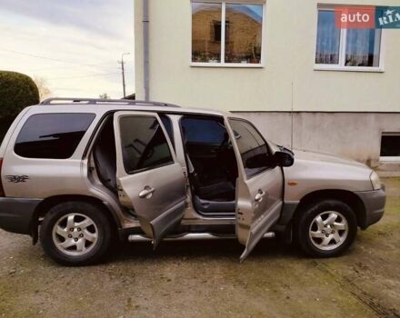 Сірий Мазда Трибьют, об'ємом двигуна 2 л та пробігом 301 тис. км за 5200 $, фото 7 на Automoto.ua