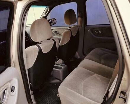 Сірий Мазда Трибьют, об'ємом двигуна 2 л та пробігом 301 тис. км за 5200 $, фото 11 на Automoto.ua