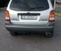 Сірий Мазда Трибьют, об'ємом двигуна 3 л та пробігом 297 тис. км за 6600 $, фото 1 на Automoto.ua
