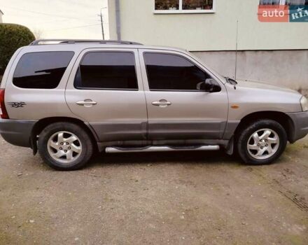 Сірий Мазда Трибьют, об'ємом двигуна 2 л та пробігом 301 тис. км за 5200 $, фото 3 на Automoto.ua