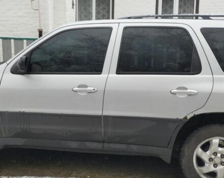 Сірий Мазда Трибьют, об'ємом двигуна 2 л та пробігом 364 тис. км за 2500 $, фото 2 на Automoto.ua