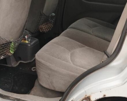 Сірий Мазда Трибьют, об'ємом двигуна 2 л та пробігом 364 тис. км за 2500 $, фото 5 на Automoto.ua