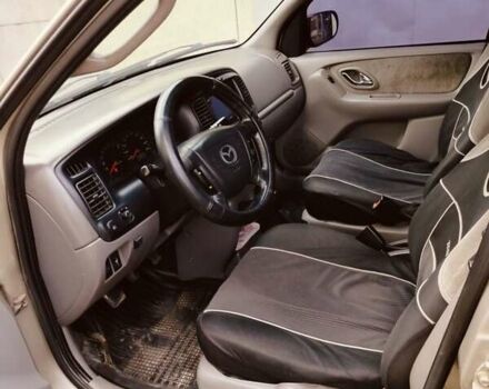 Сірий Мазда Трибьют, об'ємом двигуна 2 л та пробігом 301 тис. км за 5200 $, фото 10 на Automoto.ua