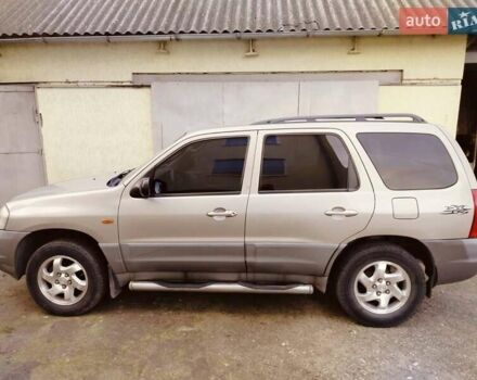 Сірий Мазда Трибьют, об'ємом двигуна 2 л та пробігом 301 тис. км за 5200 $, фото 4 на Automoto.ua