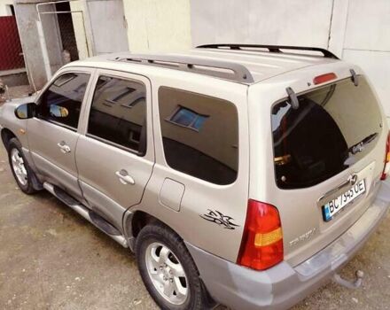 Сірий Мазда Трибьют, об'ємом двигуна 2 л та пробігом 301 тис. км за 5200 $, фото 2 на Automoto.ua