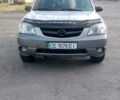 Сірий Мазда Трибьют, об'ємом двигуна 3 л та пробігом 297 тис. км за 6600 $, фото 1 на Automoto.ua