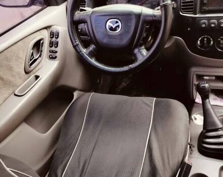 Сірий Мазда Трибьют, об'ємом двигуна 2 л та пробігом 301 тис. км за 5200 $, фото 15 на Automoto.ua