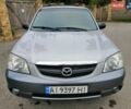 Сірий Мазда Трибьют, об'ємом двигуна 3 л та пробігом 275 тис. км за 4800 $, фото 1 на Automoto.ua