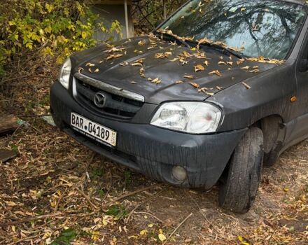 Сірий Мазда Трибьют, об'ємом двигуна 2 л та пробігом 260 тис. км за 2500 $, фото 1 на Automoto.ua