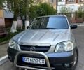 Сірий Мазда Трибьют, об'ємом двигуна 3 л та пробігом 205 тис. км за 7500 $, фото 1 на Automoto.ua