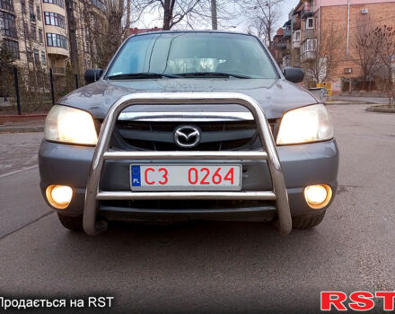 Серый Мазда Трибьют, объемом двигателя 3 л и пробегом 261 тыс. км за 3300 $, фото 5 на Automoto.ua