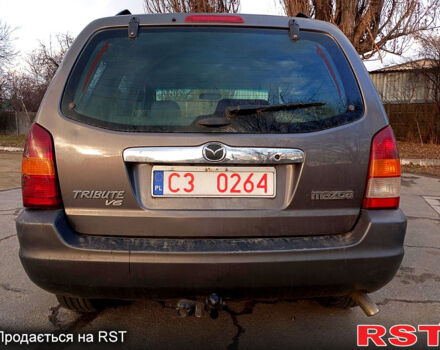 Серый Мазда Трибьют, объемом двигателя 3 л и пробегом 262 тыс. км за 3200 $, фото 9 на Automoto.ua