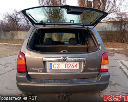 Серый Мазда Трибьют, объемом двигателя 3 л и пробегом 261 тыс. км за 3300 $, фото 8 на Automoto.ua