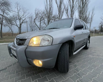 Серый Мазда Трибьют, объемом двигателя 3 л и пробегом 290 тыс. км за 6100 $, фото 16 на Automoto.ua